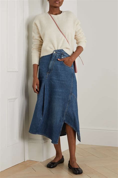 Asymmetric denim midi skirt in blue .